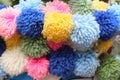 Colorful pom poms as a background