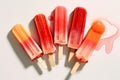 Colorful popsicle displayed against a plain white backdrop. Generative AI Royalty Free Stock Photo