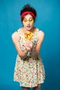 Colorful portrait young funny fashion girl posing on blue Royalty Free Stock Photo