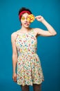 Colorful portrait young funny fashion girl posing on blue Royalty Free Stock Photo