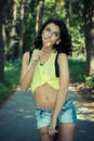 Colorful portrait of young funny fashion girl posing in summer style outfit Royalty Free Stock Photo