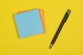 Colorful postit note on a yellow background Royalty Free Stock Photo