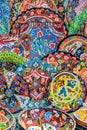 Colorful pottery dishes in Dubai souks, UAE