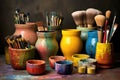 colorful pottery glazes and brushes