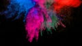 colorful powder explosion colored cloud dust explode on black