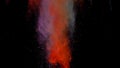 colorful powder explosion colored cloud dust explode on black