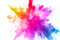 Colorful powder explosion on white background. Abstract pastel color dust particles splash