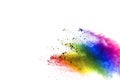 Colorful powder explosion on white background.Pastel color dust particle splashing