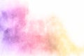 Colorful powder explosion on white background. Pastel color dust particle splashing