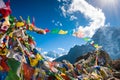 Colorful prayer flags on Thokla pass in Himalayas, Nepal Royalty Free Stock Photo