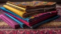 Colorful Prayer Mats and Books on Textured Background