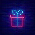 Colorful present with bow neon icon. Gift box. Happy Birthday concept. Outer glowing effect banner. Vector illustration Royalty Free Stock Photo