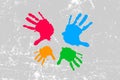 Colorful  prints of hand on white and grey background Royalty Free Stock Photo