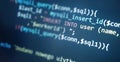 Colorful programming php and html code on a monitor. PHP language code closeup. Backend programming, software development concept Royalty Free Stock Photo