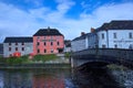 Colorful pubs and hotels beside the River Nore in Kilkenny