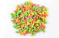 Colorful puffed rice sweets. Pile of rainbow drops cand isolated on white background Royalty Free Stock Photo