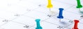 Colorful Push Pins On Calendar Showing Busy Schedule Royalty Free Stock Photo