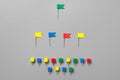 Colorful push pins isolate on gray background Royalty Free Stock Photo