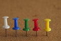 Colorful push pins in a row Royalty Free Stock Photo