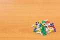 Colorful push pins on wooden background. with copy space Royalty Free Stock Photo