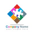 Colorful puzzle piece logo on white