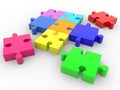 Colorful puzzle pieces on a white Royalty Free Stock Photo