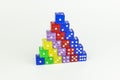 Colorful pyramid of neatly stacked game dice Royalty Free Stock Photo