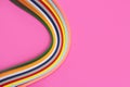 Colorful quilling, twisting paper, abstract rainbow on pink background Royalty Free Stock Photo