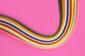 Colorful quilling, twisting paper, abstract rainbow on pink background Royalty Free Stock Photo