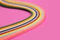 Colorful quilling, twisting paper, abstract rainbow on pink background Royalty Free Stock Photo