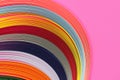 Colorful quilling, twisting paper, abstract rainbow on pink background Royalty Free Stock Photo