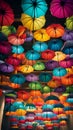 A colorful and quirky image of rainbow umbrellas hanging upside down from the ceiling creating a unique and eye-catching decor