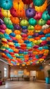 A colorful and quirky image of rainbow umbrellas hanging upside down from the ceiling creating a unique and eye-catching decor