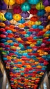 A colorful and quirky image of rainbow umbrellas hanging upside down from the ceiling creating a unique and eye-catching decor