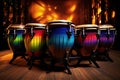 Colorful rainbow conga drums with unique patterns, arranged on a stage under dramatic lighting ready for a concert Royalty Free Stock Photo