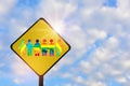 Colorful rainbow human model holding hands on yellow sign on beautiful blue sky with fluffy cloud background