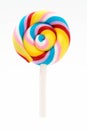 colorful rainbow lollipop swirl isolated on white Royalty Free Stock Photo