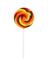 Colorful rainbow lollipop swirl on wooden stick isolated on white background Royalty Free Stock Photo