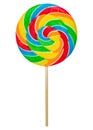 Colorful rainbow lollipop twisted on wooden stick isolated on white background. Caramel is spiral twisted into a large circle or r Royalty Free Stock Photo