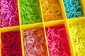 A Colorful Rainbow loom rubber bands in a box Royalty Free Stock Photo