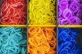 A Colorful Rainbow loom rubber bands in a box Royalty Free Stock Photo