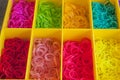 A Colorful Rainbow loom rubber bands in a box Royalty Free Stock Photo