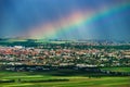 Colorful rainbow over the green fields and vineyards Royalty Free Stock Photo