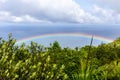 Colorful rainbow over Praslin Island, Seychelles. Royalty Free Stock Photo