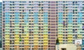 Colorful rainbow pastel building with basketball court and facade windows background. Architecture building design in Choi Hung