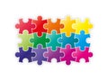 Colorful rainbow puzzle pieces forming a square Royalty Free Stock Photo