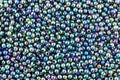 Colorful rainbow shiny beads texture background