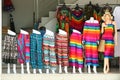 colorful rainbow of skirt long trousers and suit in street shop