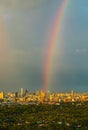 A colorful rainbow in the sky above skyscraper at bangkok