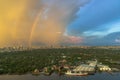 A colorful rainbow in the sky above skyscraper at bangkok